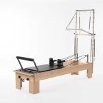 studio reformer with tower and mat