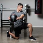 medicine ball with handles gymstick in use